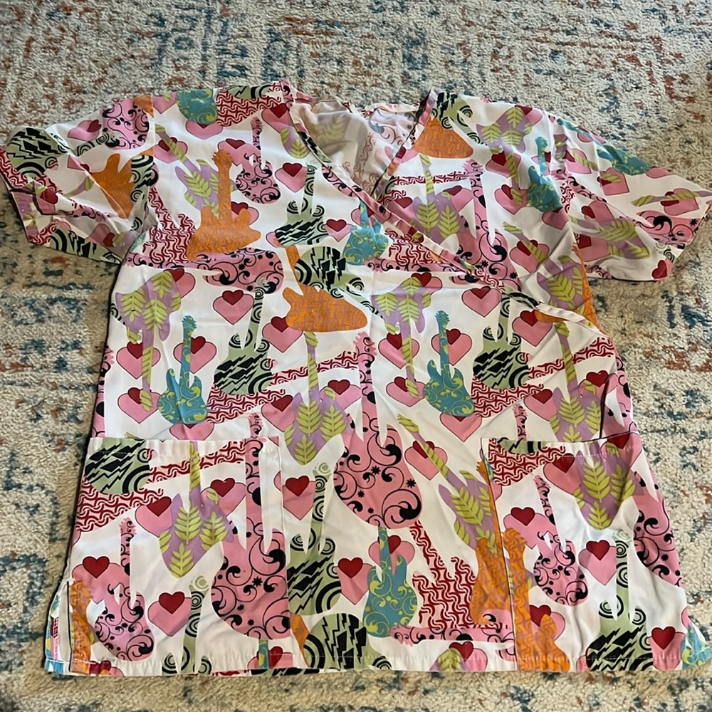 Gently worn scrub top with two waist pockets